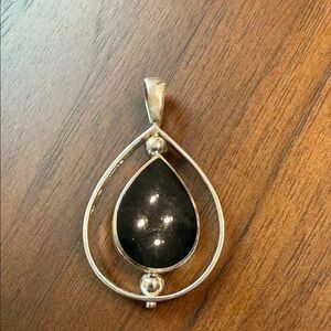 Elegant Silver and Black Teardrop Pendant